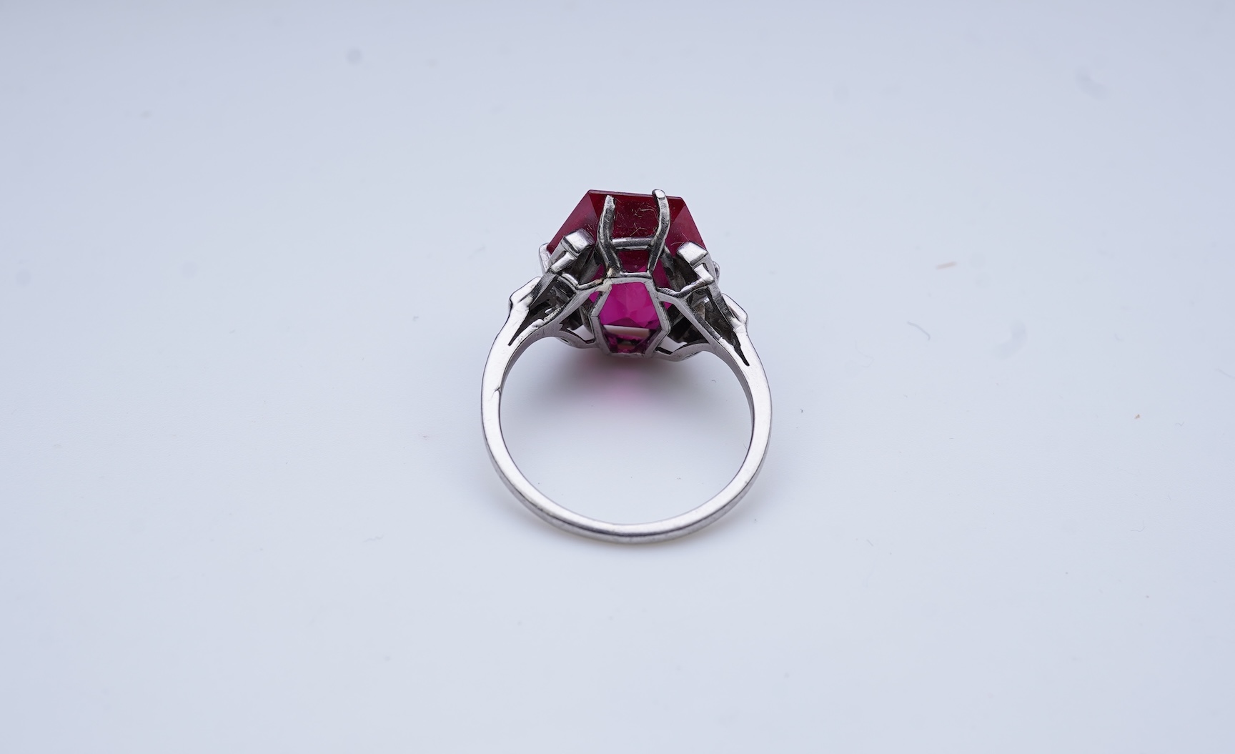 A synthetic ruby and diamond ring